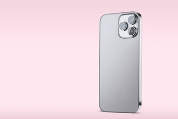 A contemporary smartphone is positioned upright against a light pink background. The device showcases a smooth and clean design, ideal for showcasing technology features.