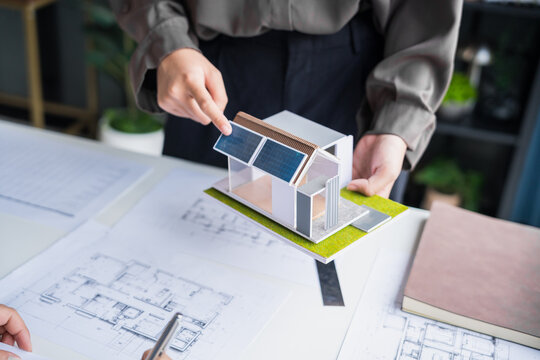 Engineer planning for Solar panels green energy Business man working Innovation  green eco friendly in modern office business  Planing Bio economy for business renewable energy eco friendly.