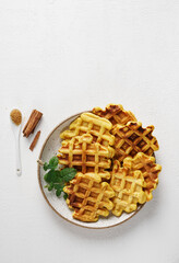 Autumn breakfast dessert, pumpkin waffle, copy space, top view