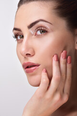 Beautiful Young Woman with Clean Fresh Skin. Close up Portrait.  Fashion Model Girl Face. Perfect...
