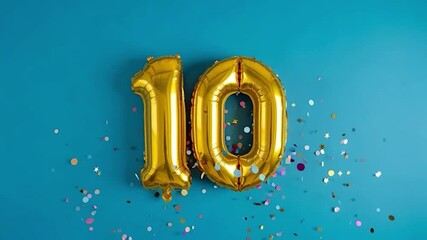 Shiny gold foil balloons displaying the number ten surrounded by colorful confetti on blue background - Powered by Adobe