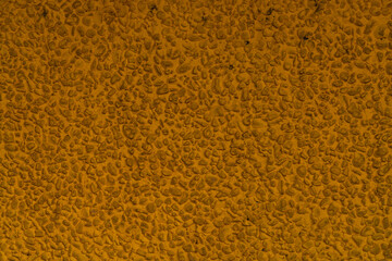 Gelbes Waschbetonmuster