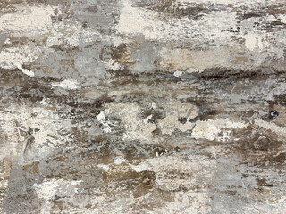 Close up of random decorative washed paint texture in abstract grunge and dirt pattern. In shades of grey, black, white, and brown color. Graphic background. Seamless background texture