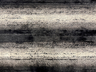 Close up of decorative background in black and white horizontal stripes color. Fabric seamless background texture.