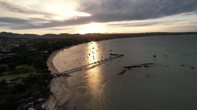 Sunset on the Manguinhos beach old pier 2