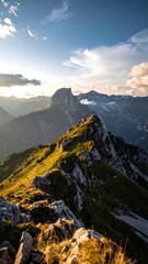 Mountain ridge at sunset, dramatic peaks