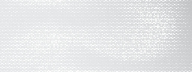 Light gray background with white circular dots.Tech-inspired pattern using various sized specks and particles. Vector graphic design with gradient halftone technique.