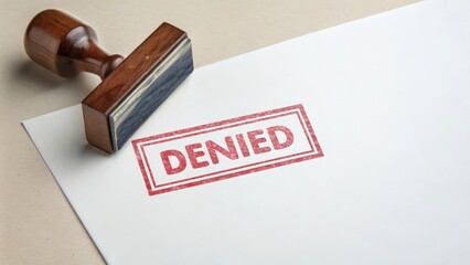 Stamp marking the word Denied on a court document