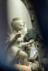 Goddess idols are being prepared with clay before festival. Idols being made for Durga Puja festival.