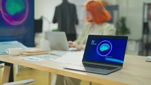Diverse business professionals, both male and female, collaborate in a bright modern office, using an AI-powered virtual assistant to brainstorm innovative ideas, analyze big data insights