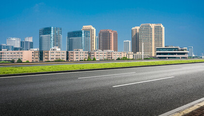 Modern Urban Landscape Featuring High-Rise Buildings and Clear Blue Sky