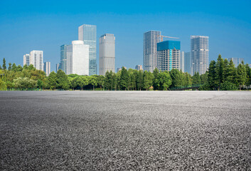Modern Urban Landscape with Lush Greenery and Clear Blue Skies