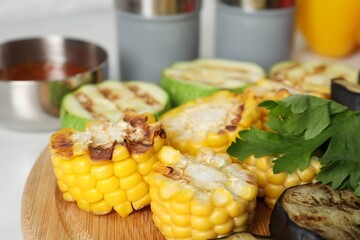 Vegetarian barbeque. Tasty grilled vegetables served on table, closeup