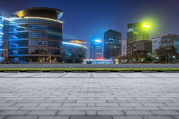 Vibrant Urban Nightscape with Modern Architecture and City Lights