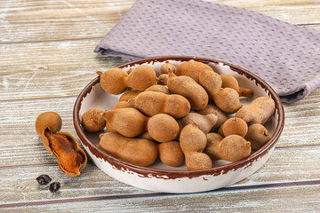 Tropical exotic Tamarind fruit heap
