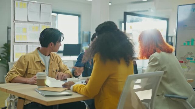 Diverse fintech innovators and multiethnic professionals collaborate in an agile hackathon workshop, integrating AI powered analytics and adaptive business models to drive exponential growth, digital