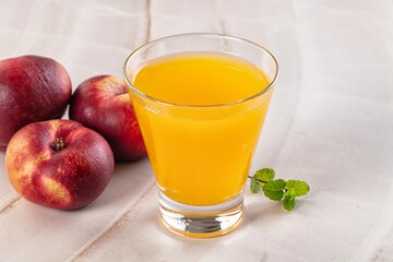 Vitamin beverage - peach juice glass