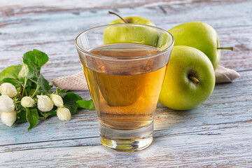 Apple yellow juice in the glass