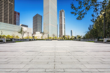 Modern Urban Plaza Showcasing Sleek Architecture and Clear Blue Skies