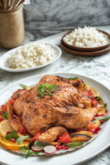 Delicious roasted chicken dinner with rice and vegetables