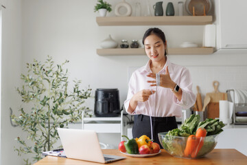 Woman measuring arm, living healthy, online diet consultation
