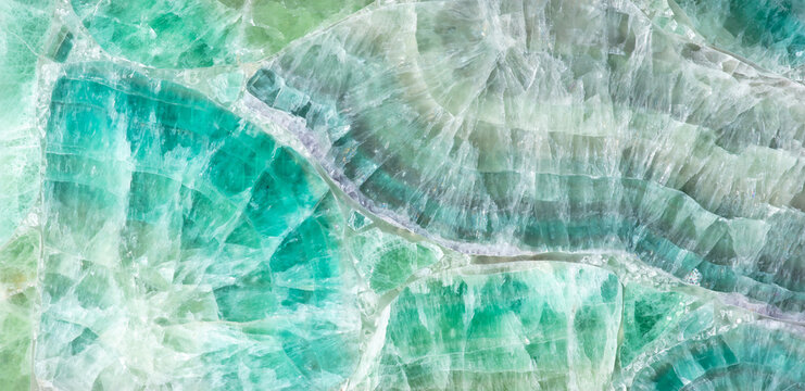 Green Fluorite stone background, natural texture in fresh color as part of your interior work.