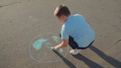 Clean planet Earth, boy child draws chalk asphalt, Kid child baby boy, Hopeful chalk artist, boy...