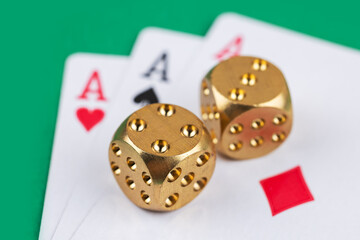 Playing cards and dices. Gambling concept. Green background