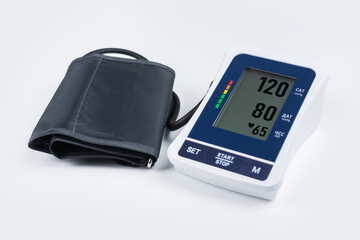 modern tonometer on blue background, pressure 120 to 80 on monitor