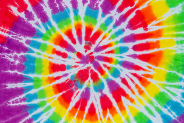 colorful spiral tie dye pattern fabric texture background.

