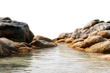 Granite rock beach with clear shallow water and sunlight reflections, isolated on transparent background