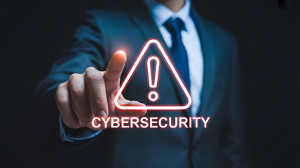 Professional touching digital alert triangle for cybersecurity threat protection and data security awareness