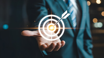 Confident professional presents a glowing bullseye with an arrow hitting the center, symbolizing success.
