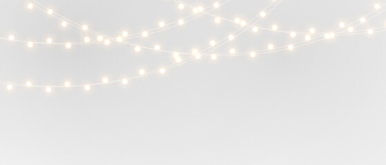 Elegant string lights overlay on black and white backgrounds, glowing warm garland creating festive atmosphere for Christmas decoration and celebration projects.	