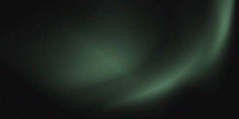 Soft green light color gradation on black background.