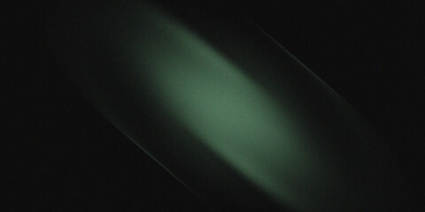 Soft green light color gradation on black background.