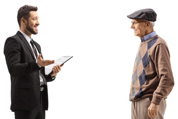 Businessman holding a clipboard and talking to an elderly man