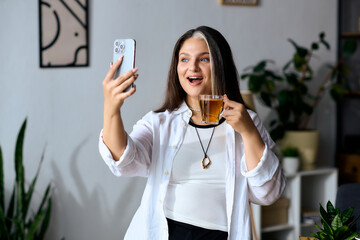 Woman with Waardenburg syndrome enjoying sharing a joyful moment while taking selfie