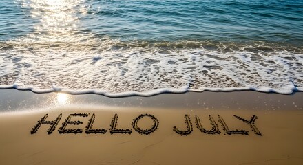 The words hello july written in the sand on a beach, with gentle waves washing ashore under a bright, sunny sky, welcoming the summer month