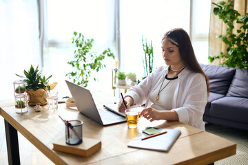 Woman with Waardenburg syndrome working remotely in a cozy home environment