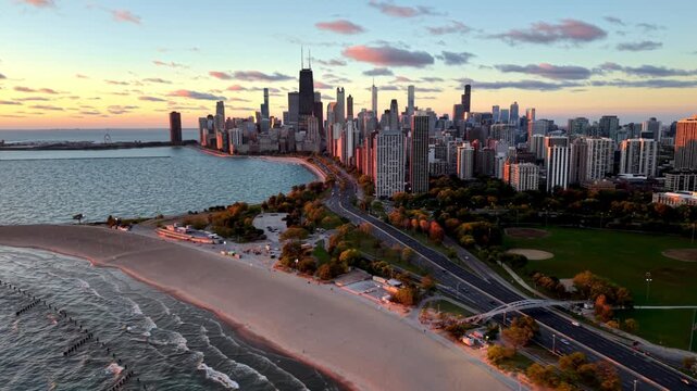aerial pan of the chicago illinois skyline over lake michigan