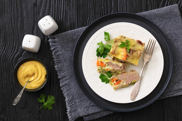 Cheesy ground meat vegetables casserole on a plate