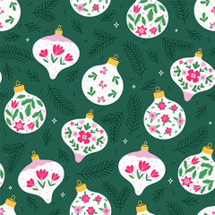 Seamless pattern with Christmas balls decorated with pink flowers. Vector graphics.