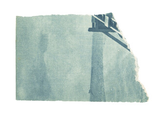 Vintage torn piece of aged newspaper texture. Old antique ripped sheet paper isolated.