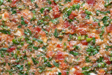 Close-Up of Turkish Lahmacun and Its Meat Filling
