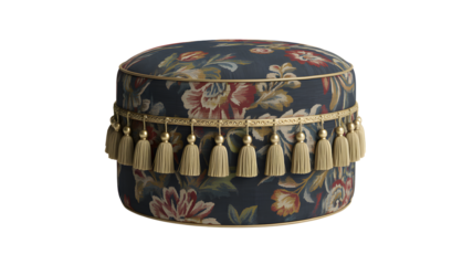 Luxurious floral ottoman with ornate gold trim and elegant tassels adds a touch of vintage charm to any sophisticated interior design.