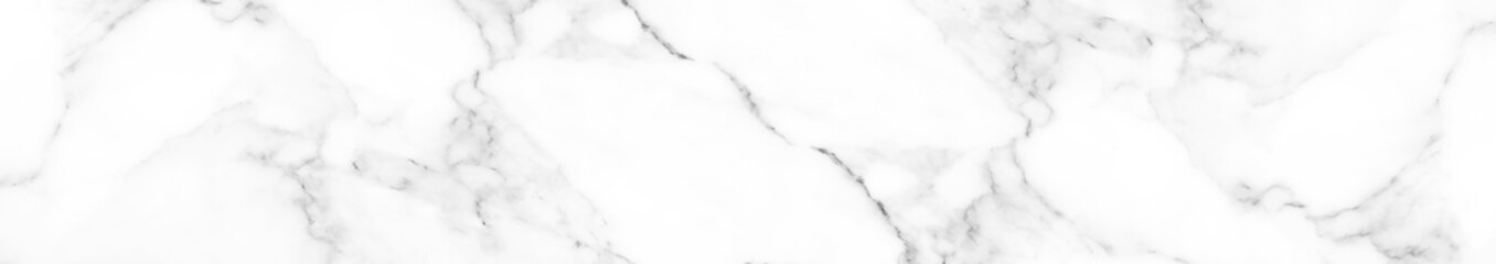 Fototapeta premium White marble surface with delicate gray veins and smooth natural stone texture for modern interior design and background aesthetics