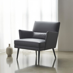 Modern dark gray armchair with decorative vase in a bright room