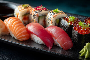 Japanese sushi ceramic plate salmon nigiri tuna nigiri maki rolls wasabi soy sauce realistic food photography