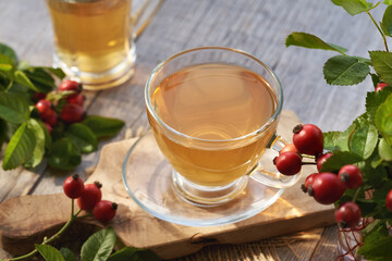 A cup of rose hip tea on a table